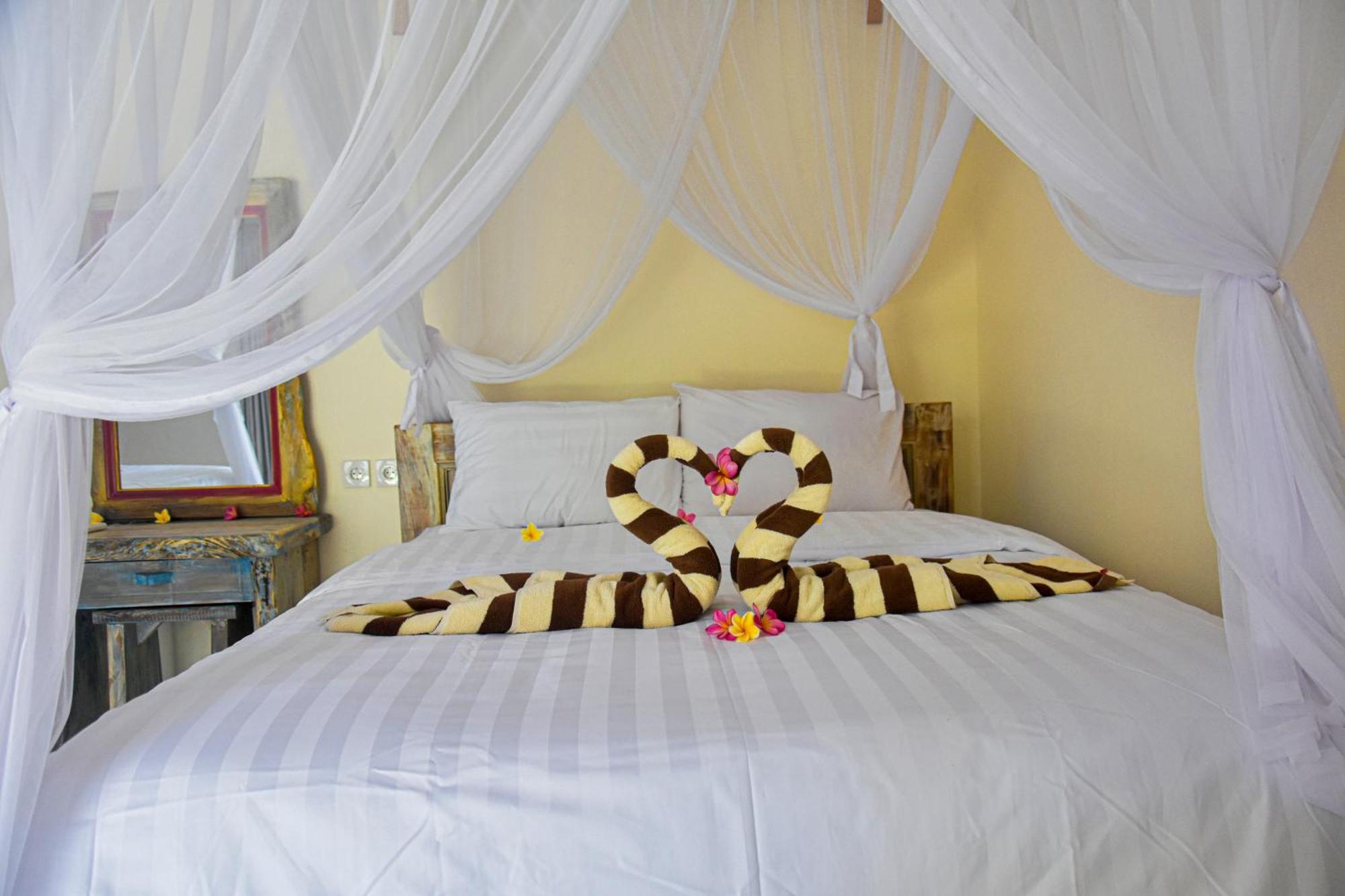 Ganesha Amed Hotel Szoba fotó
